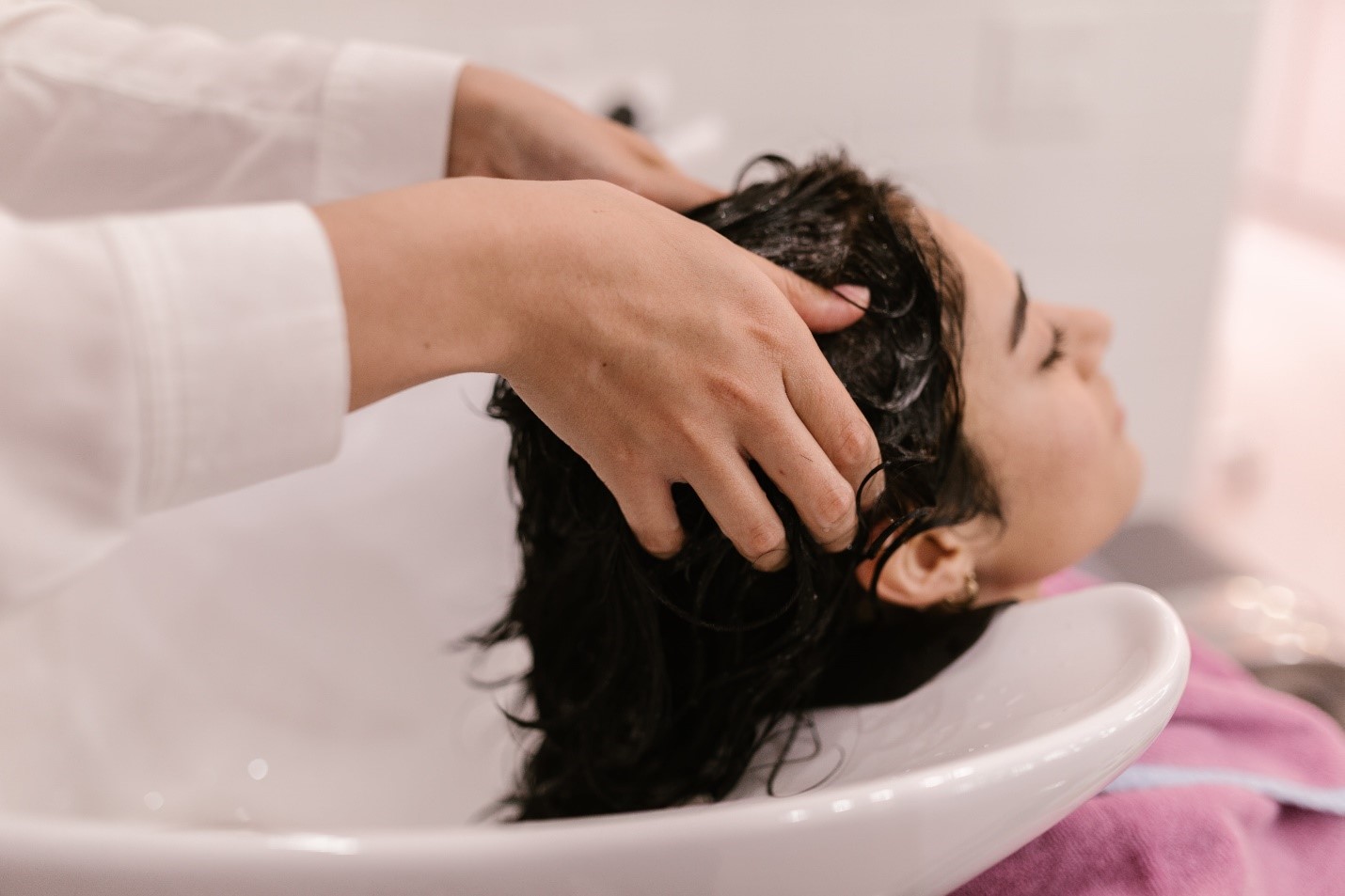Women getting a relaxing head massage